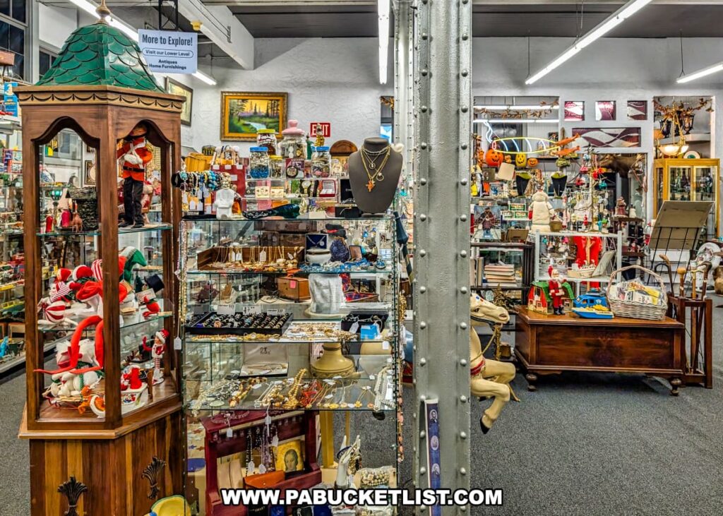 Colorful display inside Duchess Outlet Antiques in Pittston, PA, featuring shelves of vintage dishes, glassware, artwork, holiday décor, and unique collectibles arranged among antique furniture in the multi-vendor store.