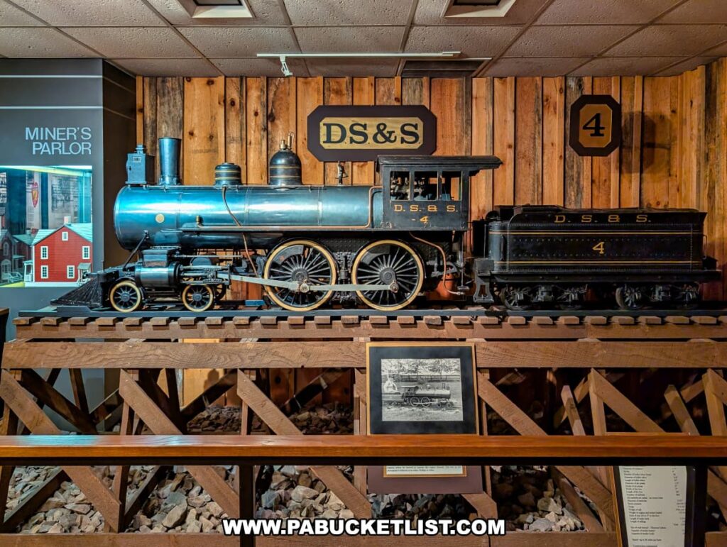 Scale model of a historic DS\&S locomotive on display at Eckley Miners’ Village in Luzerne County, Pennsylvania, representing the trains that transported anthracite coal from the mining town to regional markets.