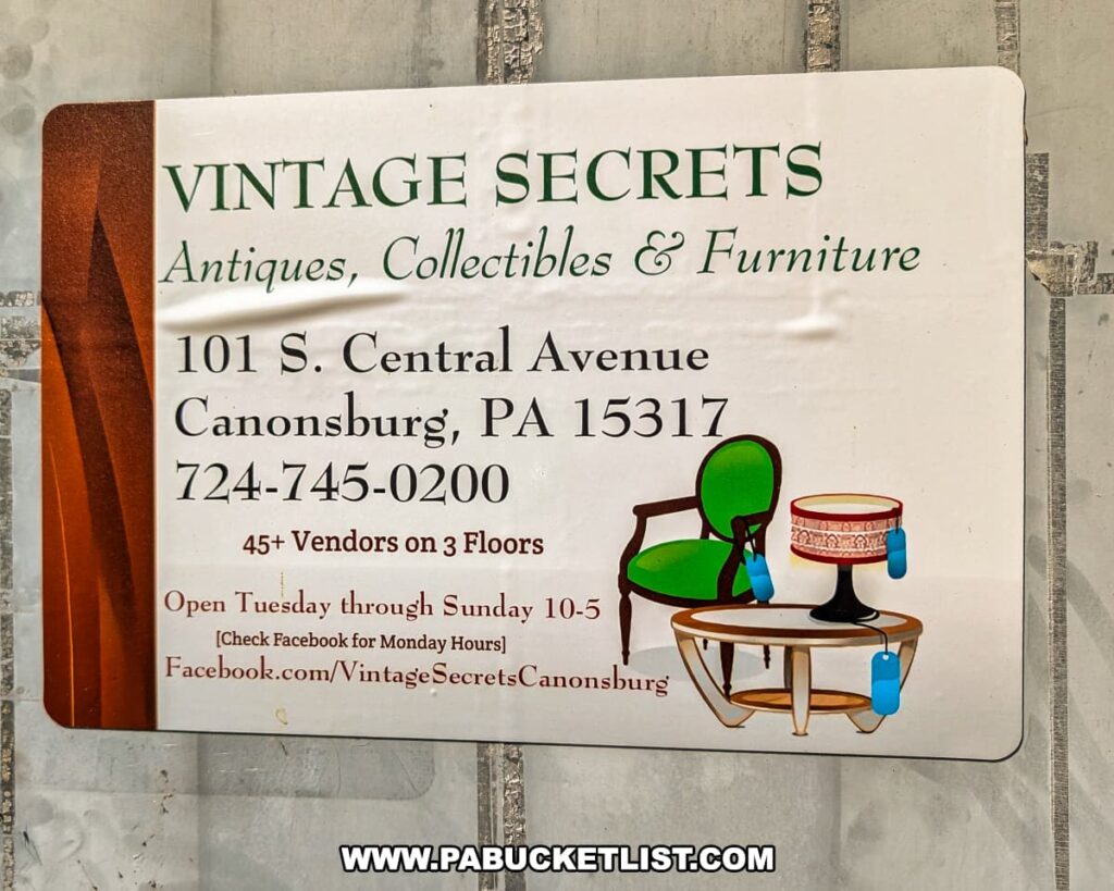 Sign at Vintage Secrets Antiques in Canonsburg, Washington County, PA, displaying the shop’s address, phone number, hours of operation, and details about 45+ vendors spread across three floors, with graphics of vintage furniture including a green chair, lamp, and table.