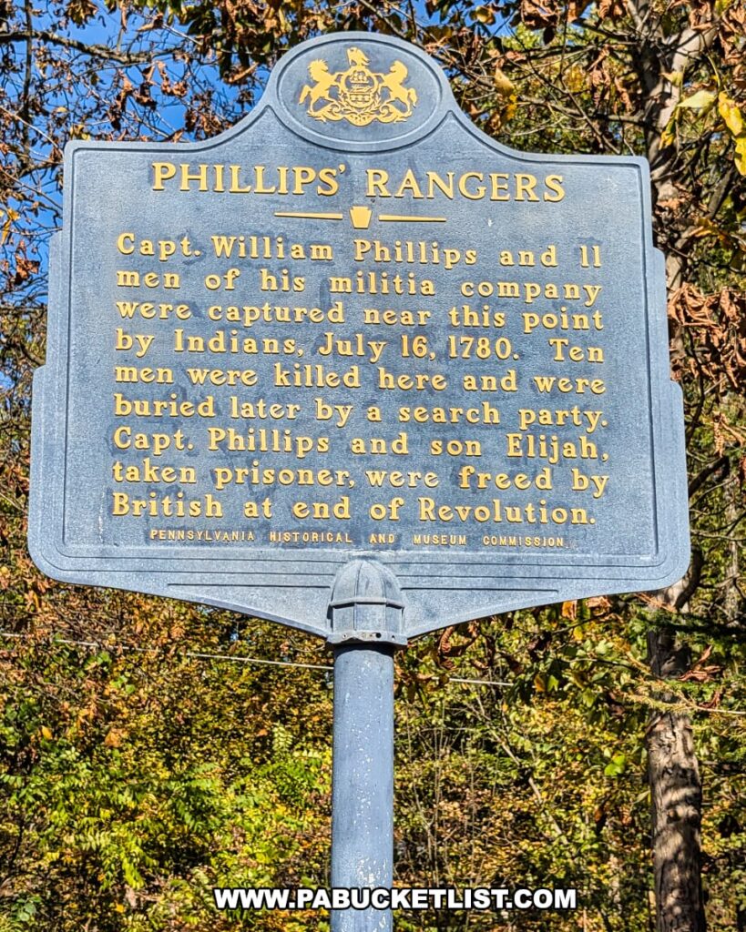 Pennsylvania Historical and Museum Commission marker titled “Phillips’ Rangers” along Route 26 in Bedford County, describing the July 16, 1780 attack in which Captain William Phillips and his militia were captured and killed, with Phillips and his son later freed at the end of the Revolutionary War.