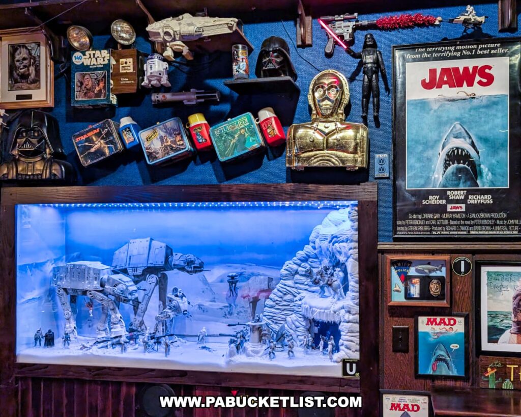 A Star Wars-themed display inside Cooper’s Seafood House in Scranton, Pennsylvania, featuring a detailed Hoth battle diorama, vintage Star Wars memorabilia, and collectibles alongside a *Jaws* movie poster and other pop culture decorations.