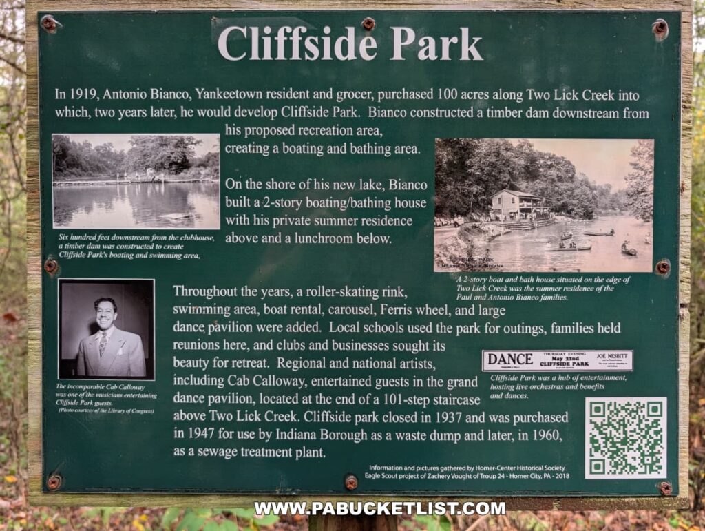 Informational sign along the Hoodlebug Trail in Indiana County, Pennsylvania, describing the history of Cliffside Park, a former recreation area developed in 1919 by Antonio Bianco along Two Lick Creek. The sign includes vintage black-and-white photos of the park’s boating and bathing facilities, an image of musician Cab Calloway who once performed there, and text recounting how the site featured a roller-skating rink, Ferris wheel, dance pavilion, and other attractions before closing in 1937. The green sign stands amid a wooded setting along the 10-mile rail trail that follows the former Pennsylvania Railroad’s Indiana Branch, named for the “Hoodlebug” passenger coach that once ran on the line.