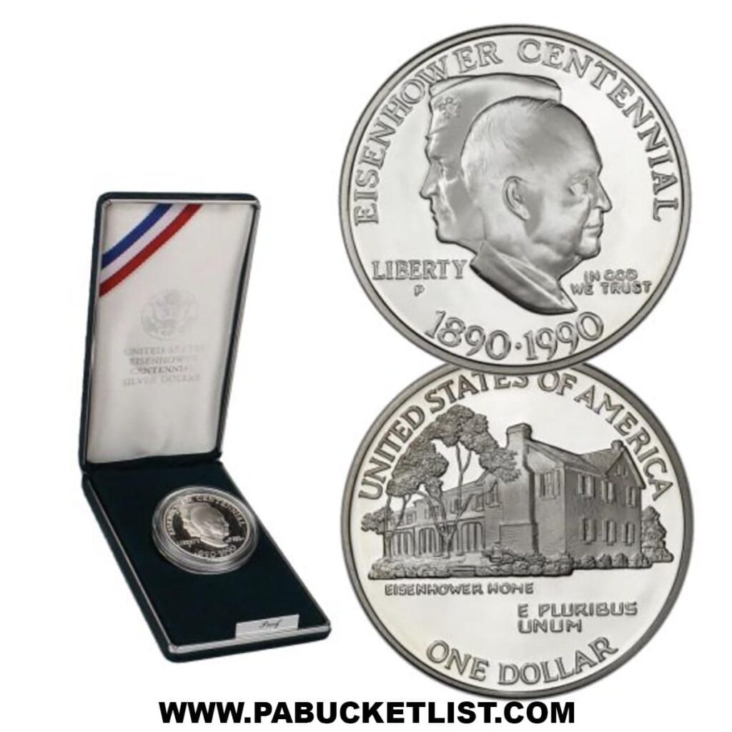 1990 Eisenhower Centennial silver dollar coin displayed in a presentation case, featuring portraits of Dwight D. Eisenhower on the obverse and an engraving of Eisenhower’s Gettysburg home on the reverse.