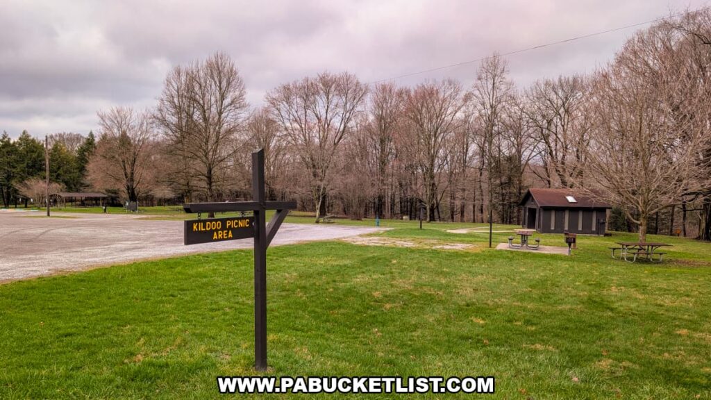 Sign for the Kildoo Picnic Area with pavilion and picnic tables at McConnells Mill State Park in Lawrence County, Pennsylvania.