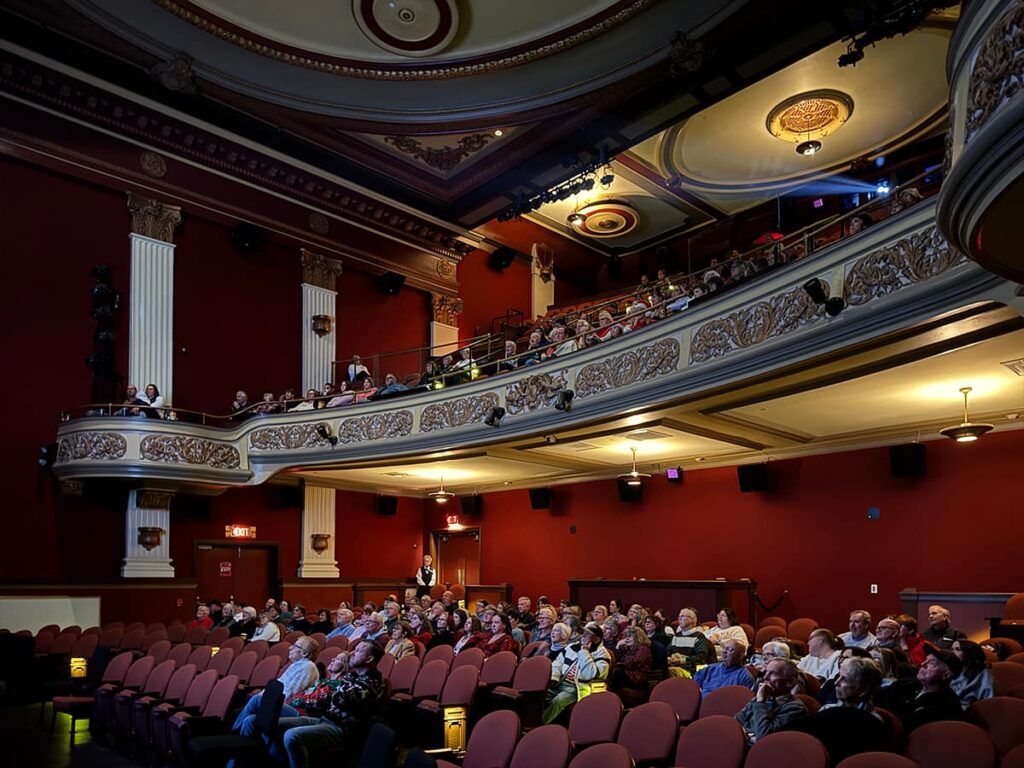 Audience seated on the main floor and balcony inside the Capitol Theatre at the Appell Center for the Performing Arts in York, Pennsylvania.