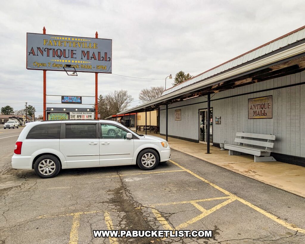 Exterior view of Fayetteville Antique & Craft Mall and roadside sign along Route 30 in Fayetteville, Franklin County, Pennsylvania.