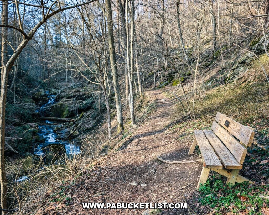Bench along the trail beside Mill Creek at the Lock 12 Historic Area in York County, Pennsylvania.