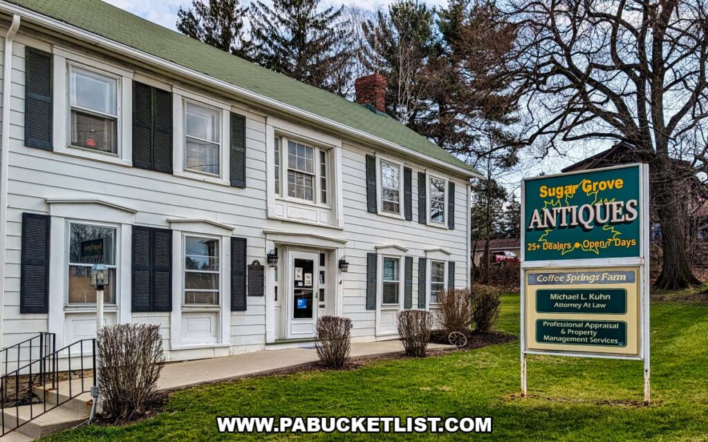 Front exterior of Sugar Grove Antiques in Somerset County PA a multi-vendor antique shop housed in one of the oldest log frame homes in Somerset