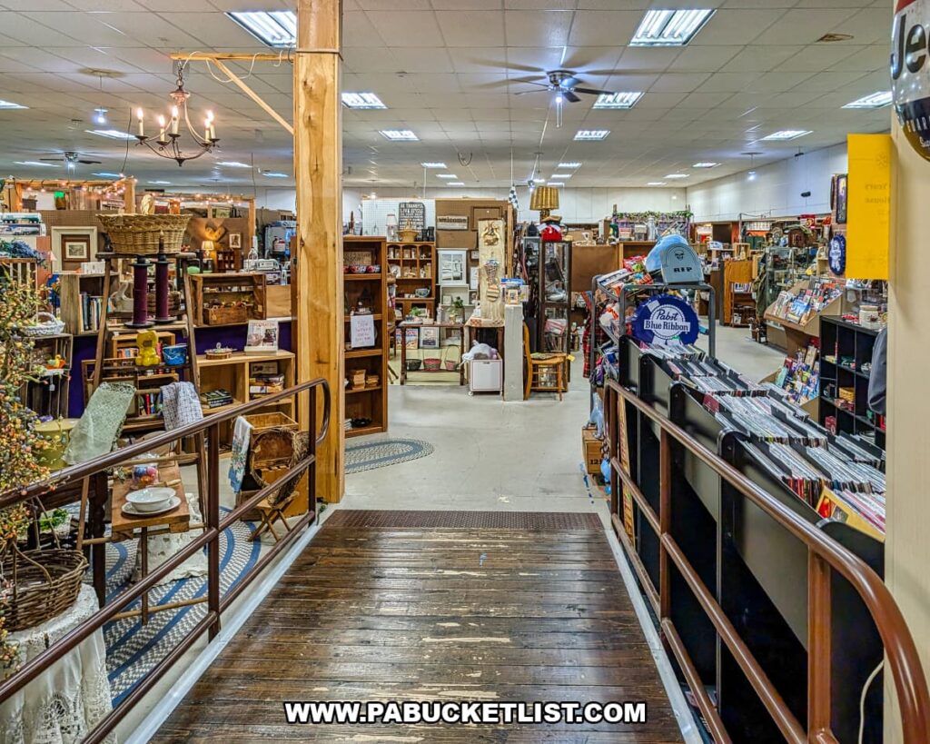 Interior view of Pen-Mar Antique Market in Waynesboro Pennsylvania showing aisles of vendor booths filled with antiques collectibles furniture and vintage items in Franklin County PA