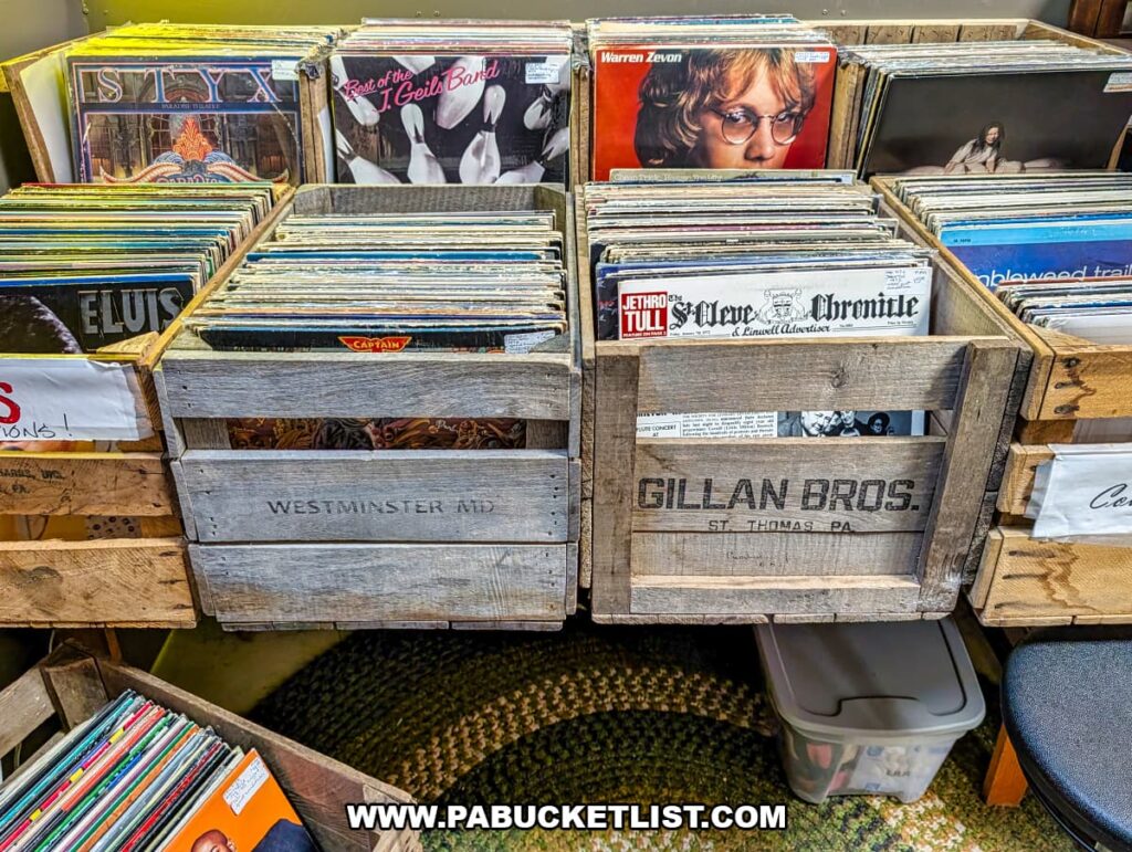 Vintage vinyl records displayed in wooden crates at Pen-Mar Antique Market in Waynesboro Pennsylvania featuring classic albums and collectibles in Franklin County PA