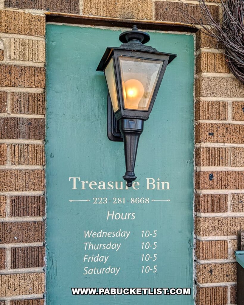 Entrance sign showing hours for Treasure Bin Antiques in Red Lion, York County, Pennsylvania