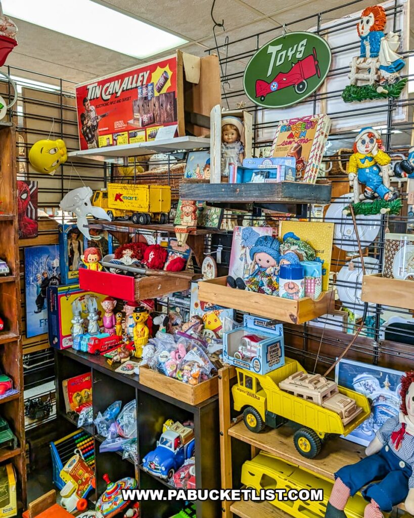 Display of vintage toys, dolls, toy trucks, and collectibles at Treasure Bin Antiques in Red Lion, York County, Pennsylvania