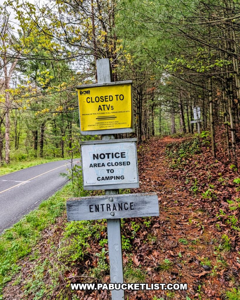 Entrance sign along roadside trailhead at Hoverter and Sholl Box Huckleberry Natural Area in Perry County Pennsylvania.